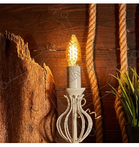 Лампа филаментная REXANT Витая свеча LCW35 7.5 Вт 600 Лм 2400K E14 золотистая колба